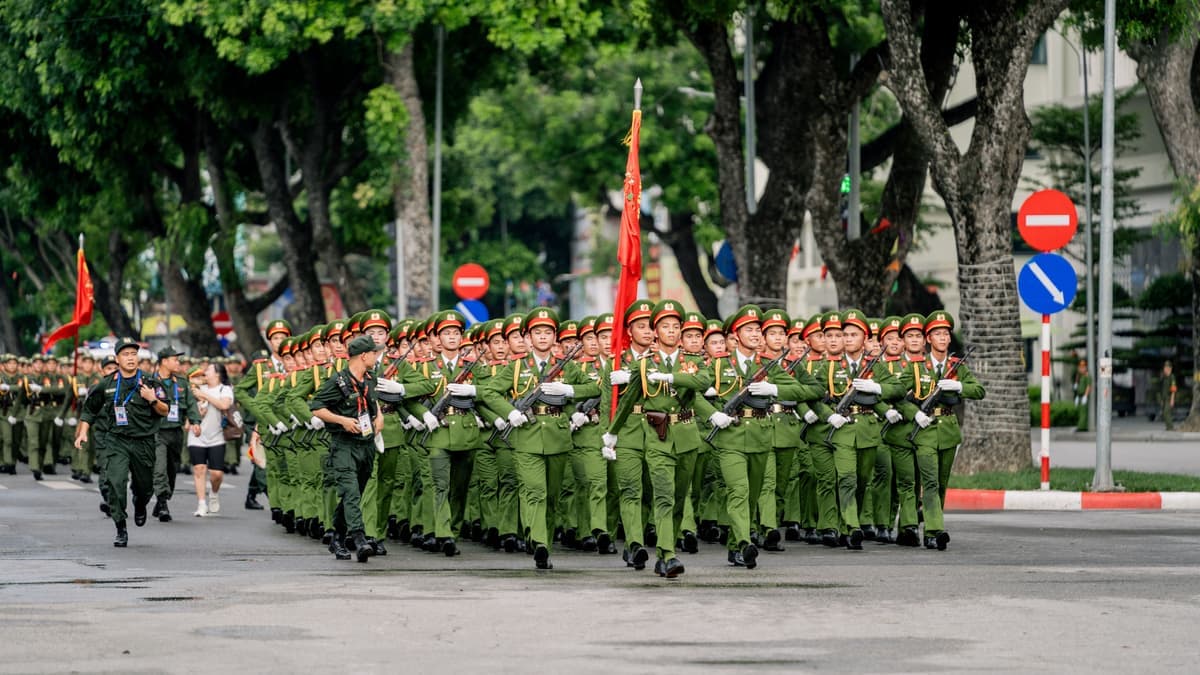 Soldiers marching in formation in a parade
