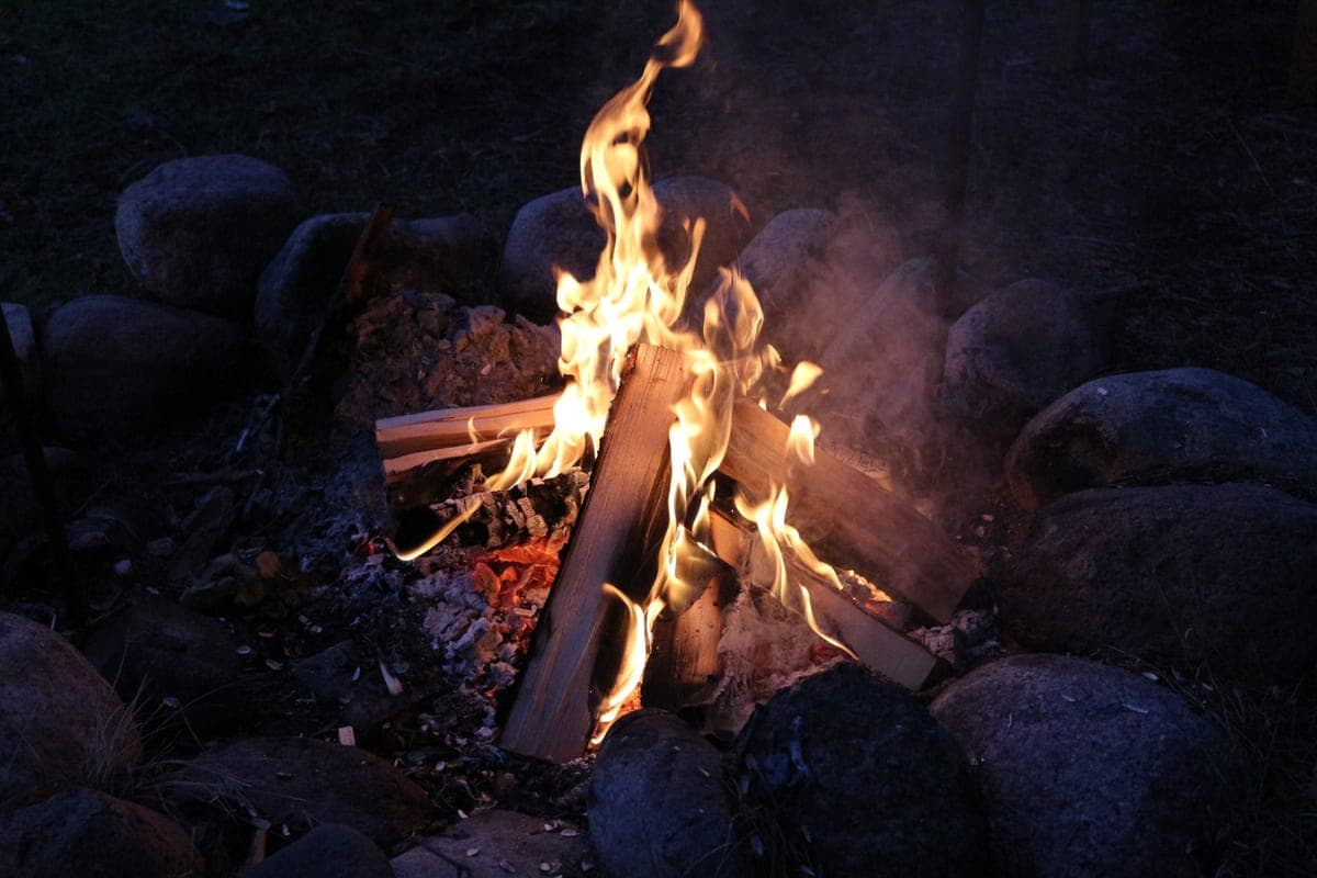 A campfire burning at night